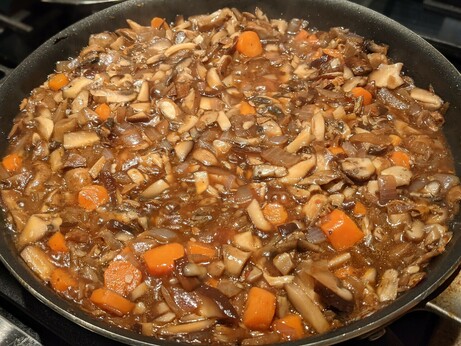 A kilogram (!) of mushrooms sauteed with carrots, onion, and garlic