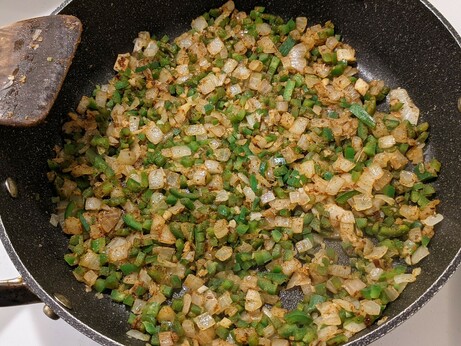 Same frying pan but now the alliums are beautifully dark and the spices are mixed in and beginning to bloom.