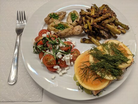 The meal as described in the post, on a white plate on a white counter top.  To the left of the plate is a fork set on a paper towel.